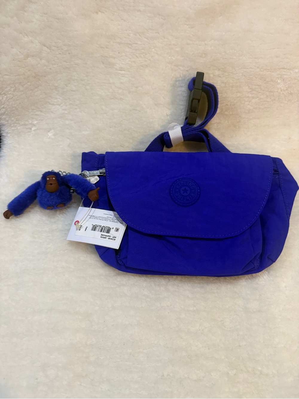 Kipling ARVIN Crossbody/waistbag in sapphire with Monkey Keychain
